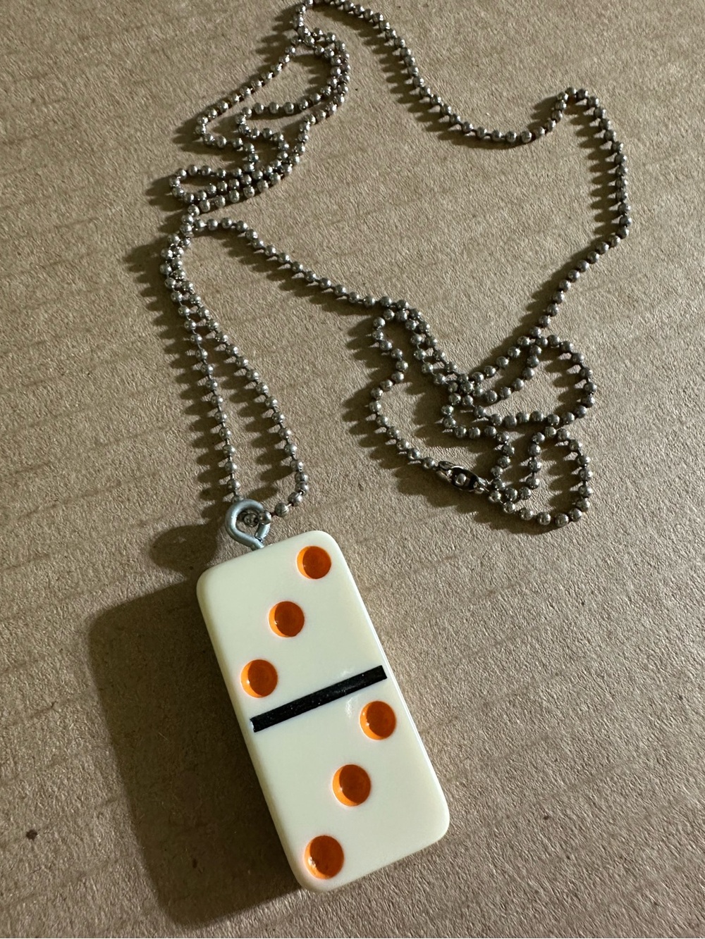 Domino necklace